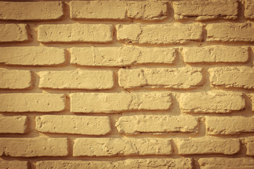 Fototapeta premium yellow brick wall for background