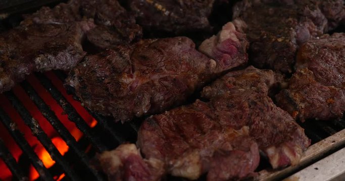 Cooking barbecue steak on the hot grill