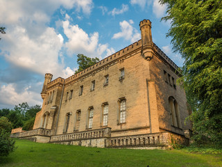 Fototapeta premium Neo-Gothic buildings surrounded by trees
