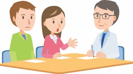 Doctor meeting couple in hospital office