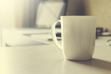 Mug coffee on table.
