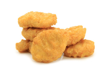 Fried chicken nuggets isolated on white background.