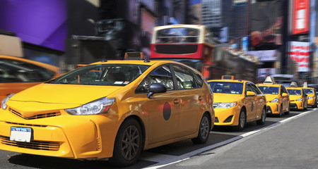Yellow Taxis in Times Square is a major commercial intersection and neighborhood in Midtown...