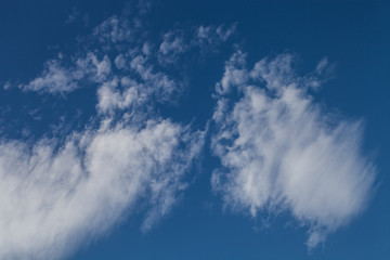 White clouds on a blue sky. Selective focus