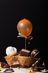 Homemade mousse cake with chocolate and waffle decor