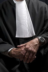 Lawyer in gown with jabot hands close up judge - obrazy, fototapety, plakaty