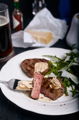 beef filet grilled with fresh arugula