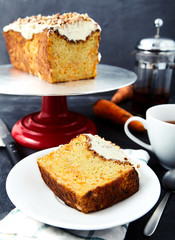 Slice of carrot cake with tea