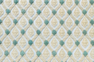 Closeup surface beautiful cement wall of temple in thailand textured background