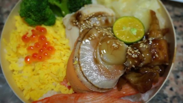 Japanese bento, seafood rice box sell at train station