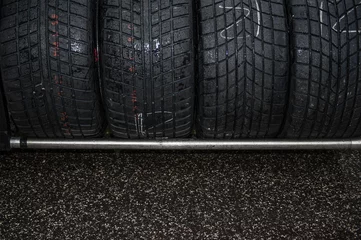 Fototapeten Wet racing tire set motor sport detail © fabioderby
