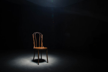 Lonely chair at the empty room