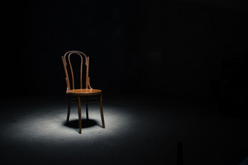 Lonely chair at the empty room - obrazy, fototapety, plakaty