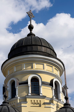 Photo of Capriana Monastery in Moldova with blue sky