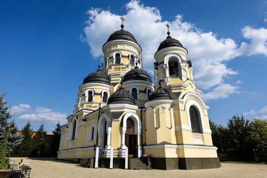 Photo of Capriana Monastery in Moldova with blue sky