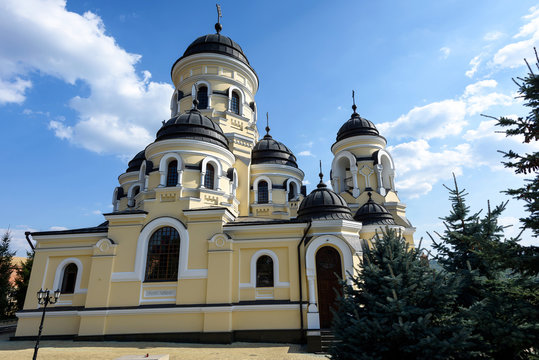 Photo of Capriana Monastery in Moldova with blue sky
