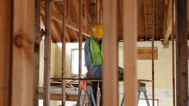 Construction worker building home