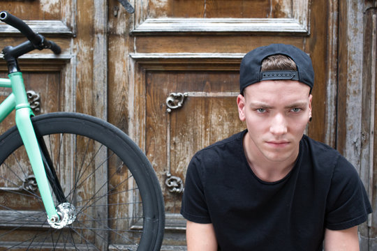 Serious hipster on bike