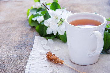 Cup of tea and spring flowers