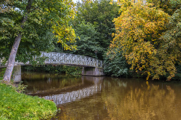 Bridge over autumn river