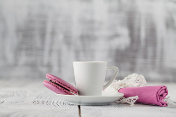 white cup of coffee on wooden table