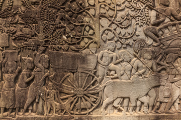 Bas-reliefs with war scenes in Bayon temple, Angkor, Cambodia
