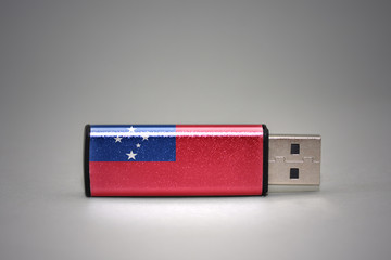 usb flash drive with the national flag of Samoa on gray background.