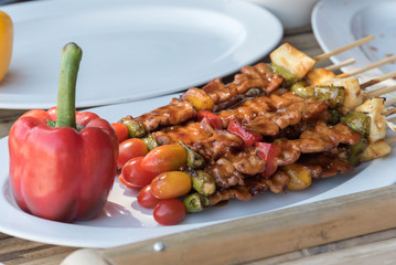 Grilling shashlik on barbecue grill