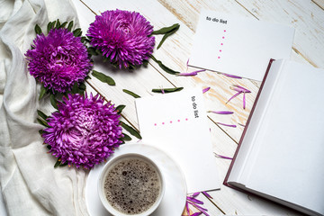 Word relax with cup of coffee and pink flowers