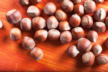 nuts in shell on wooden background