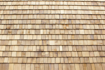 Close up of brown wood roof shingles.Wood background.