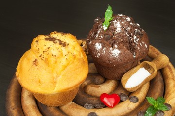 Homework muffins for breakfast. Sweet junk food. Chocolate dessert. Fresh muffins on the kitchen table. Advertising for desserts.
