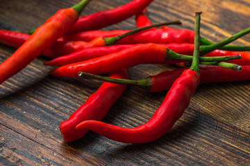 Thai Bird's Eye Chilis on a old wooden table