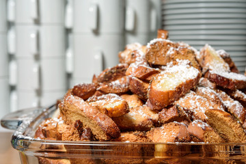 crackers of pretzels with almonds on the tray