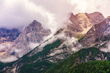 Mountain peaks in the clouds in Italy