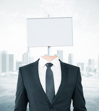 White signboard headed businessman