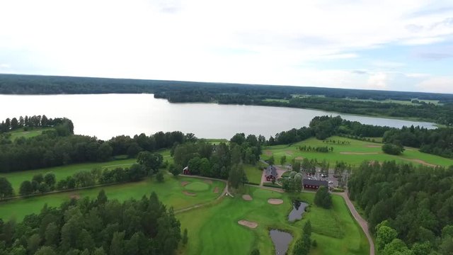 Aerial view of a flight above lake bodom and bodom golf, in Espoo, Finland