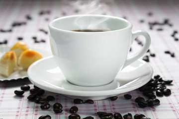 Coffee cup and coffee beans