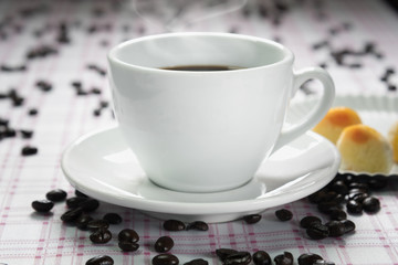 Coffee cup and coffee beans