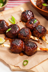 Sweet BBQ Meatballs in Barbecue Sauce. Selective focus.