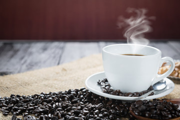 Coffee cup and beans on a rustic background. Coffee Espresso and