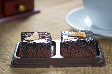 Coffee cup and coffee beans with brownie