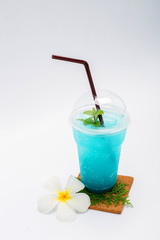 Italian blue soda and Plumeria flower