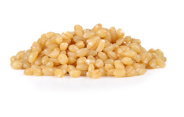 pile of pearl barley isolated on a white background.