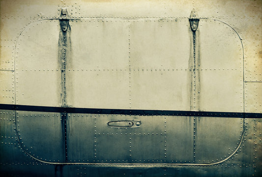 'Vintage Style' retro grunge image of aircraft exterior texture