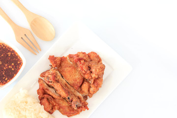 Hot Meat Dishes - Thai style fried chicken with Red Spicy Sauce and Sticky rice isolated on white background, Thai food