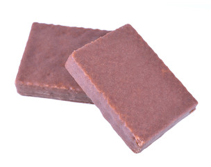 Chocolate blocks stack on white background