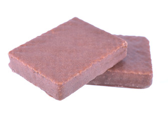 Chocolate blocks stack on white background