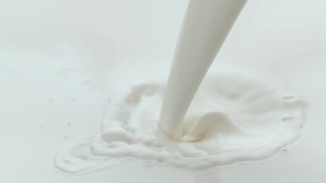 Milk pouring and splashing in slow motion; shot on Phantom Flex 4K at 1000 fps