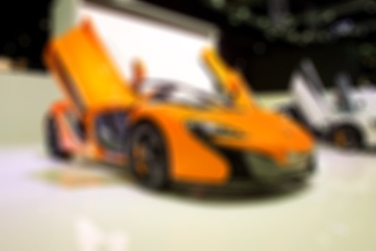 Blur of modern car in the showroom for background © scofieldza